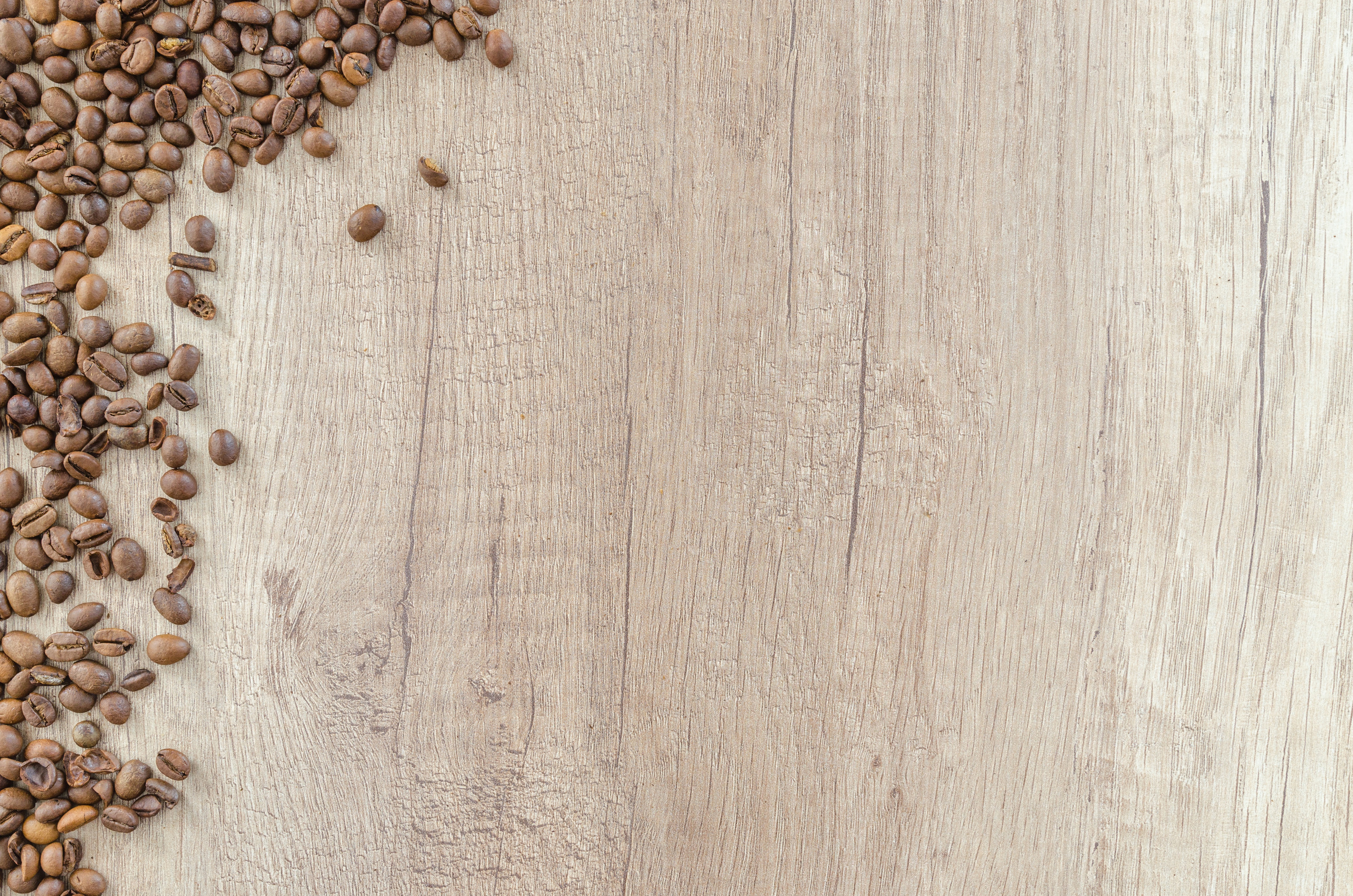 Coffee Beans on a Wooden Background